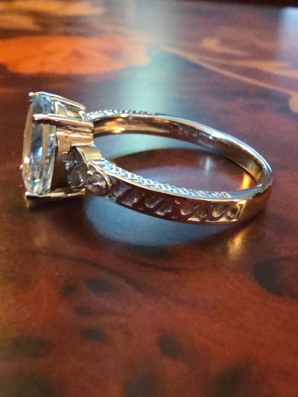 JTV Oval Glacier Topaz(TM) With White Topaz Rhodium Over Silver Ring